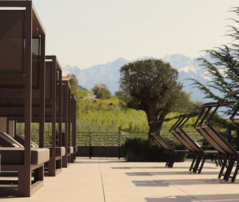 Sky Terrace with canopy beds and mountain views