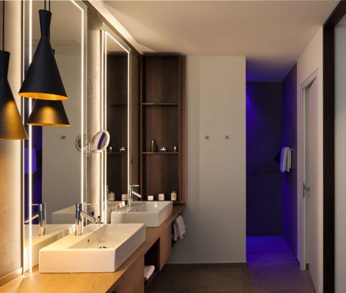 Bathroom with double washbasin and shower - Deluxe Garden Suite