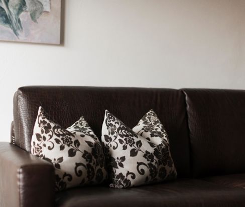 The leather couch in the living room - Anderlahn Suite