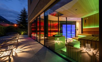 The outdoor area of the sauna at evening