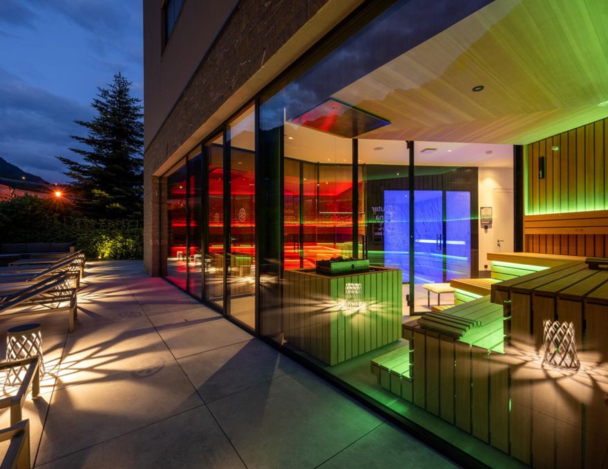 The outdoor area of the sauna at evening